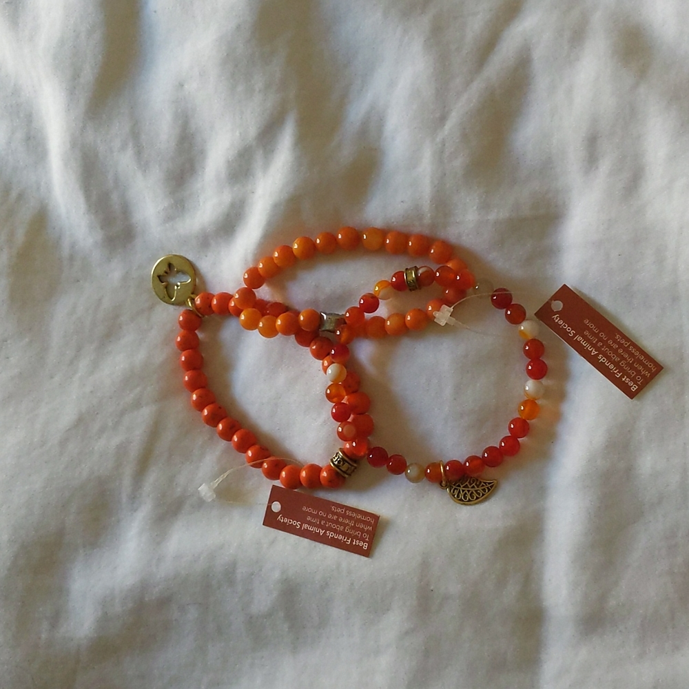Orange beaded bracelets (3)